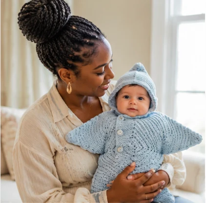Parent holding baby